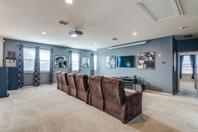 carpeted home theater with recessed lighting, visible vents, and baseboards