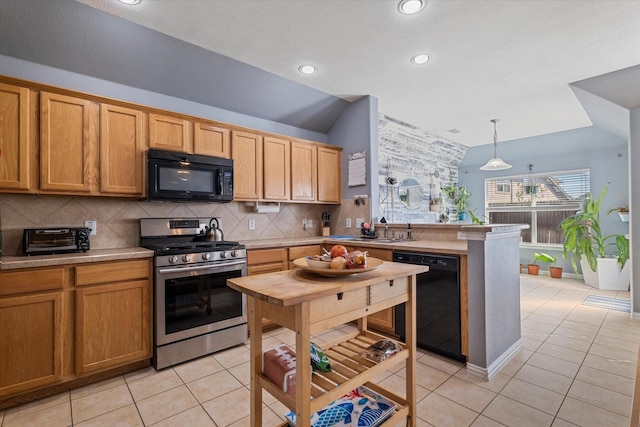 kitchen featuring black appliances, a sink, backsplash, light countertops, and light tile patterned floors