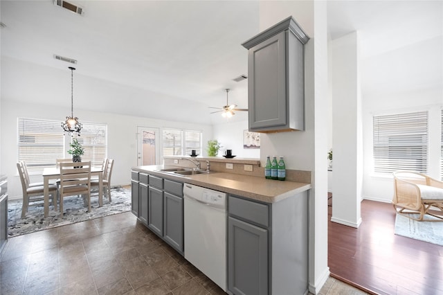 kitchen featuring a sink, white dishwasher, visible vents, and gray cabinets