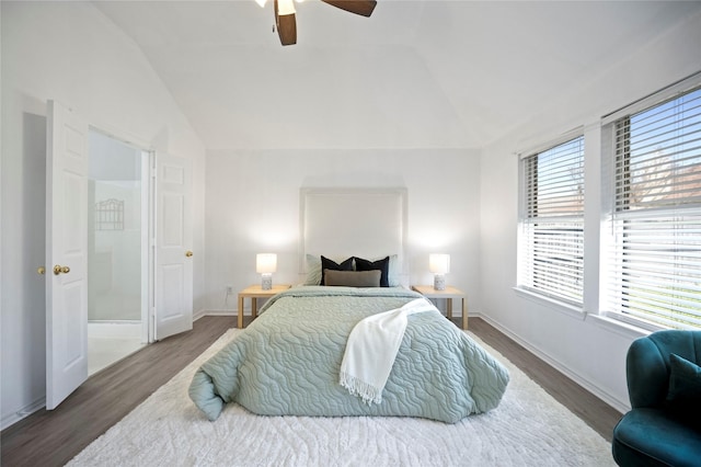 bedroom with lofted ceiling, wood finished floors, and a ceiling fan