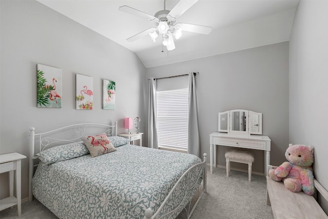 bedroom with vaulted ceiling, carpet, baseboards, and ceiling fan