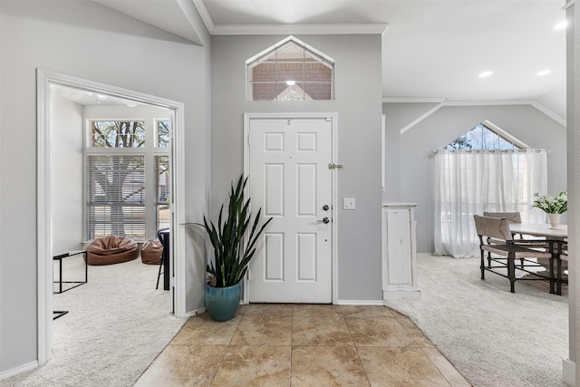 foyer featuring recessed lighting, baseboards, carpet, and crown molding