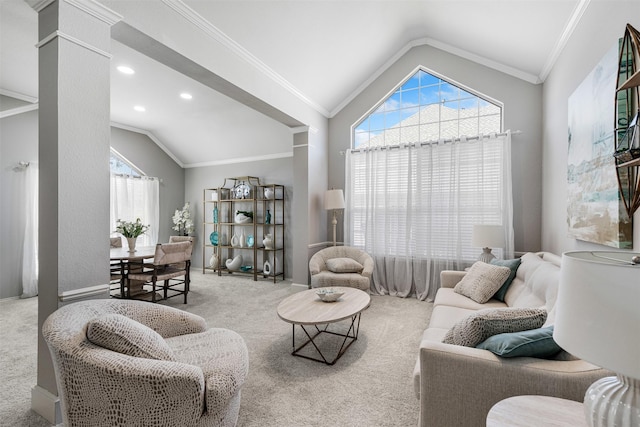 living room with decorative columns, carpet floors, plenty of natural light, and lofted ceiling