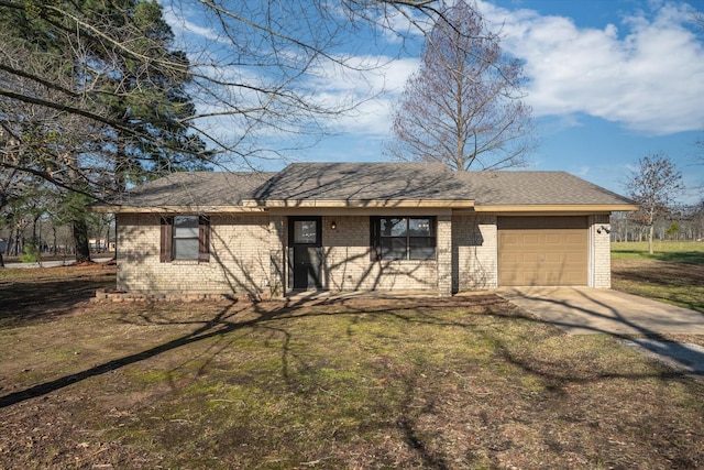 ranch-style house featuring concrete driveway, an attached garage, brick siding, and roof with shingles