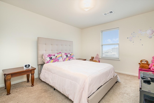 bedroom with visible vents, baseboards, and carpet flooring