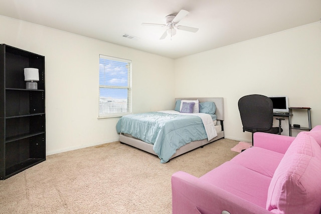 bedroom featuring visible vents, baseboards, carpet, and a ceiling fan