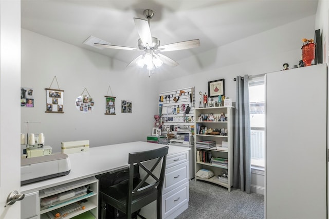 home office with ceiling fan and carpet flooring