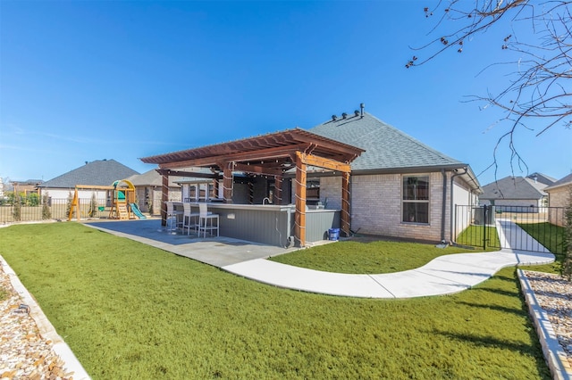 rear view of property featuring outdoor dry bar, a pergola, fence, a shingled roof, and brick siding