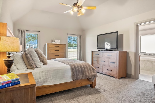 bedroom with ceiling fan, lofted ceiling, multiple windows, and light carpet