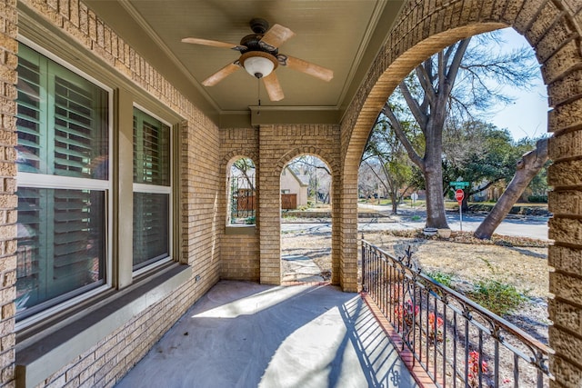 view of patio / terrace featuring a ceiling fan and covered porch