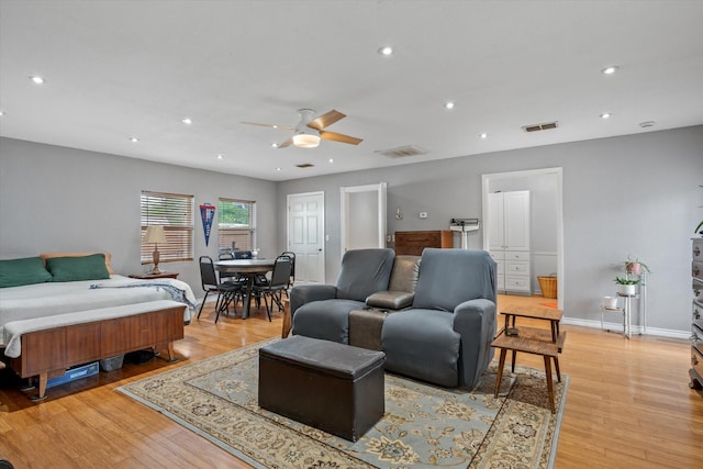 bedroom with recessed lighting, visible vents, baseboards, and light wood-style flooring