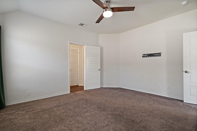 unfurnished bedroom with vaulted ceiling, visible vents, baseboards, and carpet floors