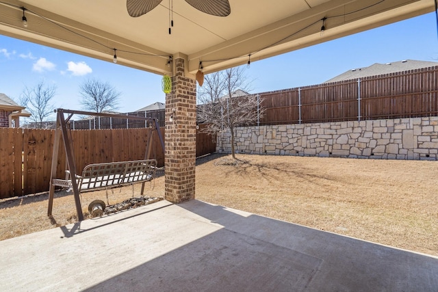 view of patio / terrace featuring a ceiling fan and a fenced backyard