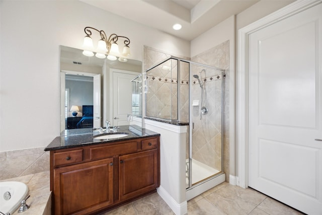 full bath featuring a bath, visible vents, a stall shower, and vanity