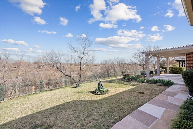 view of yard with a fenced backyard, a pergola, and a patio area