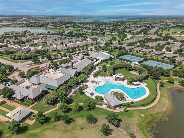 aerial view with a residential view and a water view