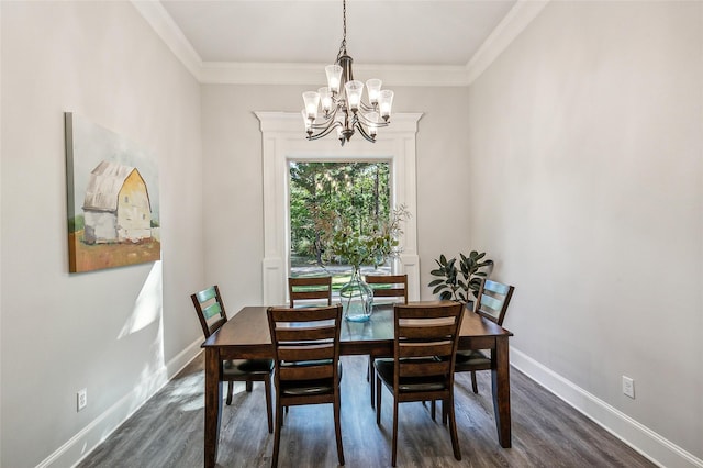 dining space featuring dark wood-style floors, baseboards, and a chandelier