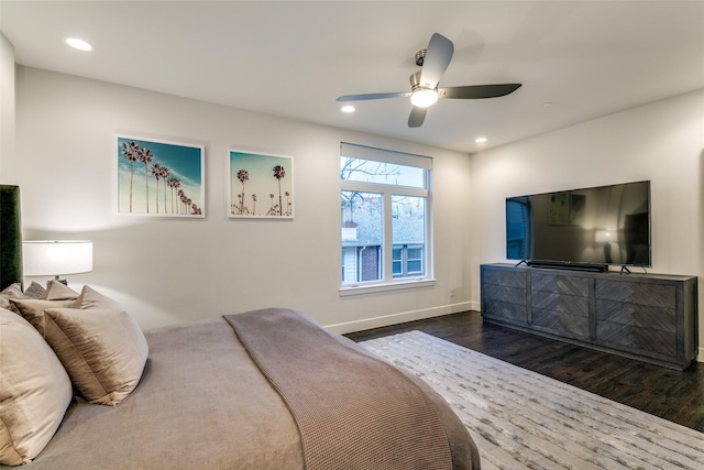 bedroom with a ceiling fan, dark wood-type flooring, recessed lighting, and baseboards