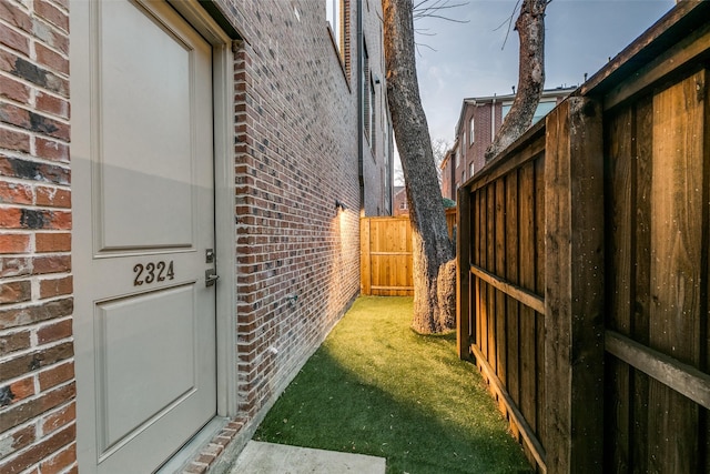 exterior space featuring a fenced backyard