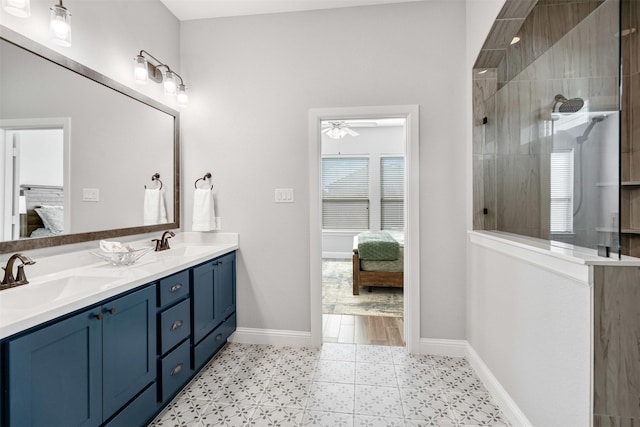 ensuite bathroom featuring ensuite bathroom, walk in shower, and a sink