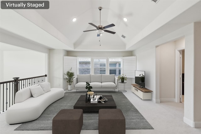 carpeted living area with a ceiling fan, visible vents, baseboards, high vaulted ceiling, and recessed lighting