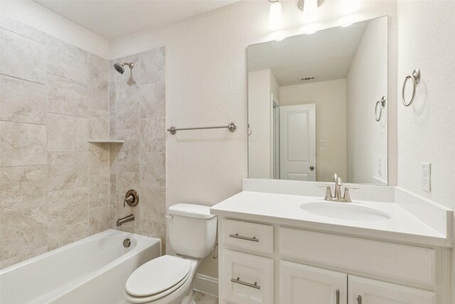 full bathroom with vanity, bathing tub / shower combination, toilet, and visible vents