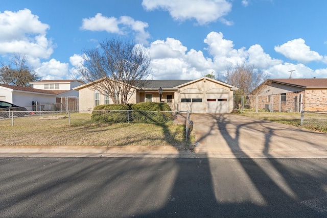 view of front of home with a fenced front yard, a garage, concrete driveway, and a front yard