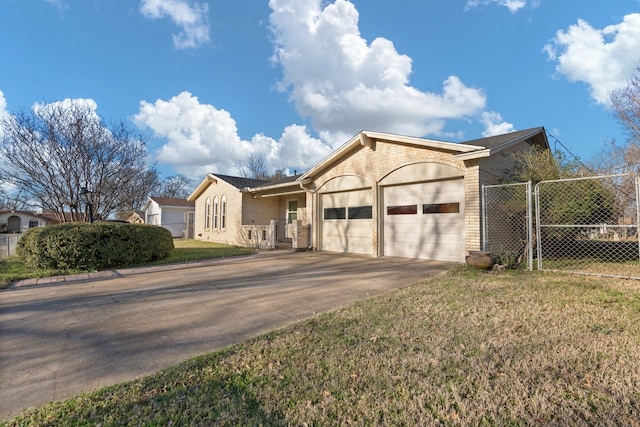 single story home featuring brick siding, an attached garage, concrete driveway, and fence