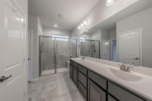 2420 Red Draw Rd, Fort Worth, TX 76177 - bathroom with double vanity, a sink, baseboards, and a stall shower