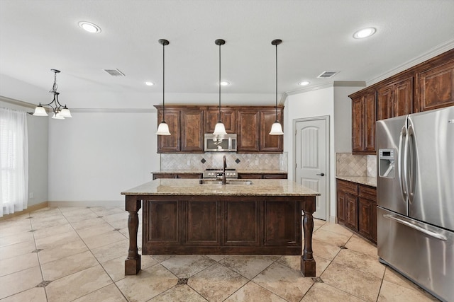 kitchen featuring dark brown cabinets, visible vents, light stone countertops, and appliances with stainless steel finishes