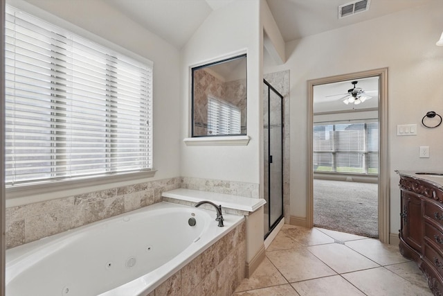 bathroom with visible vents, a shower stall, vanity, and a tub with jets