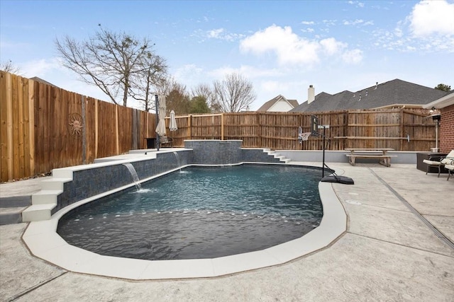 view of swimming pool with a fenced in pool, a fenced backyard, and a patio area