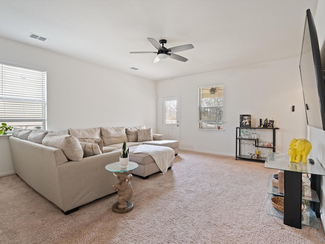 14157 Stallion Ridge Dr, Dallas, TX 75253 - carpeted living area with visible vents, baseboards, and ceiling fan