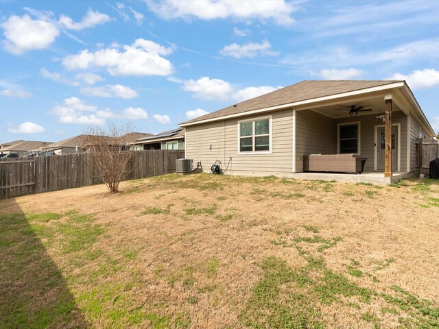 14157 Stallion Ridge Dr, Dallas, TX 75253 - back of property with an outdoor hangout area, a yard, a fenced backyard, a patio area, and a ceiling fan