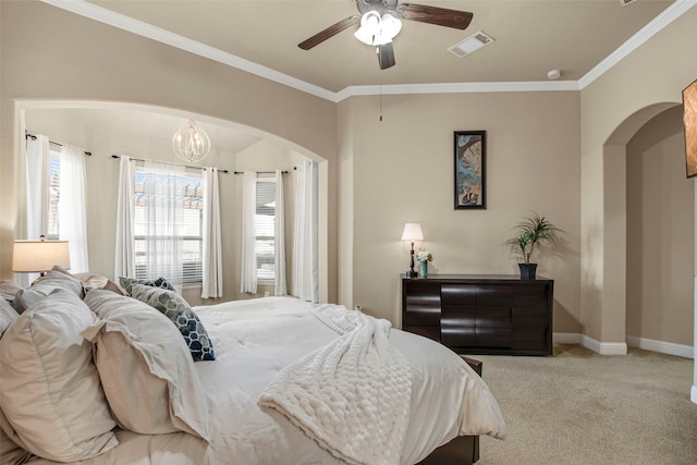 carpeted bedroom featuring arched walkways, visible vents, and ornamental molding