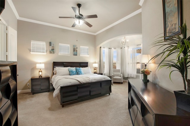 bedroom featuring baseboards, light colored carpet, and ornamental molding