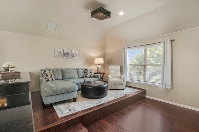 living area with vaulted ceiling, recessed lighting, baseboards, and wood finished floors