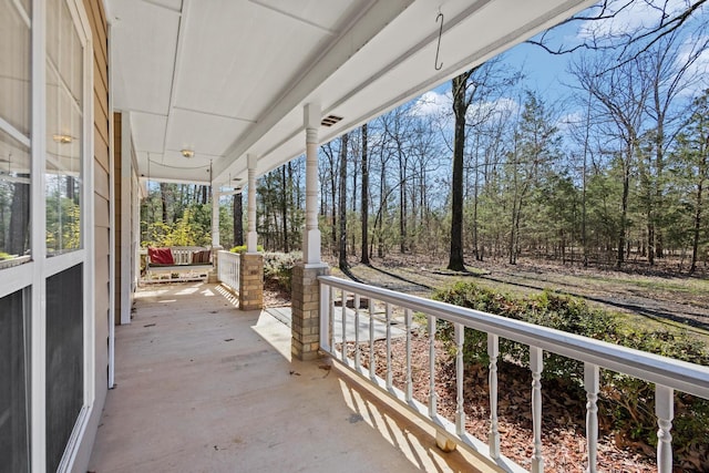 view of patio featuring a porch