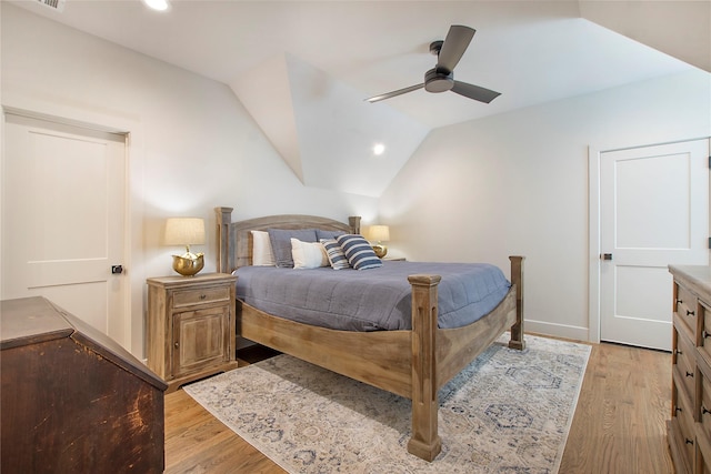 bedroom with recessed lighting, light wood-type flooring, lofted ceiling, and ceiling fan