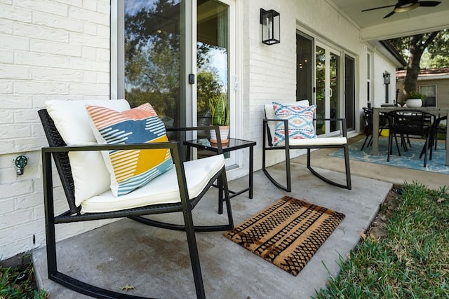 view of patio / terrace featuring french doors and ceiling fan