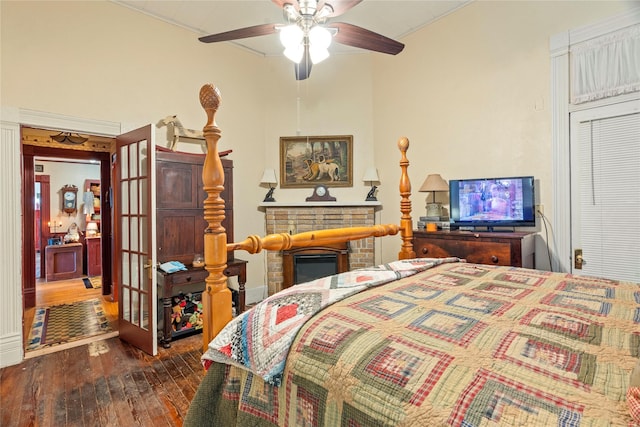 bedroom featuring hardwood / wood-style floors and a ceiling fan