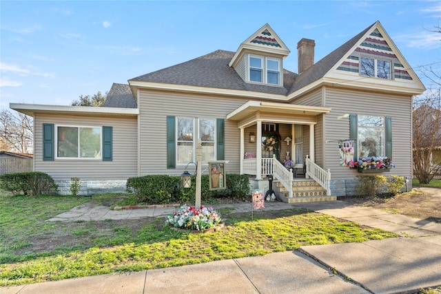 324 E Franklin St, Hillsboro, TX 76645 - view of front of property featuring roof with shingles and a chimney