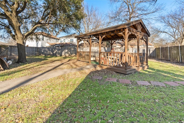 view of yard featuring a fenced backyard and a gazebo