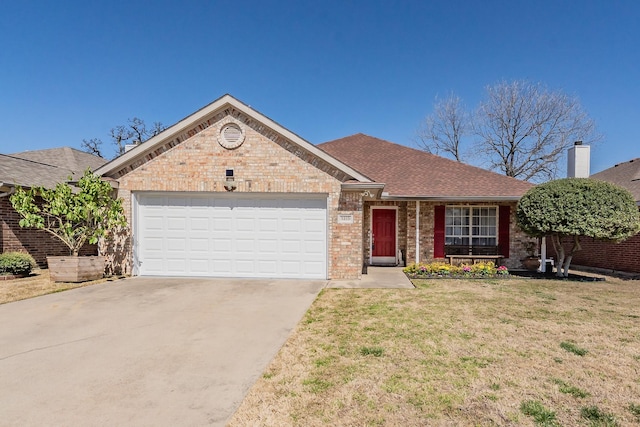 ranch-style house featuring driveway, roof with shingles, an attached garage, a front yard, and brick siding