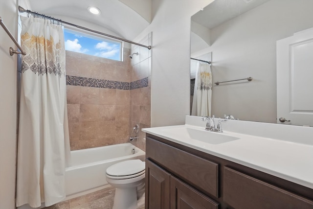 bathroom featuring shower / bathtub combination with curtain, toilet, and vanity