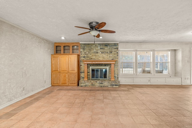 unfurnished living room featuring a textured ceiling, a brick fireplace, and crown molding