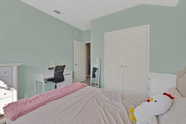 bedroom featuring a closet and visible vents