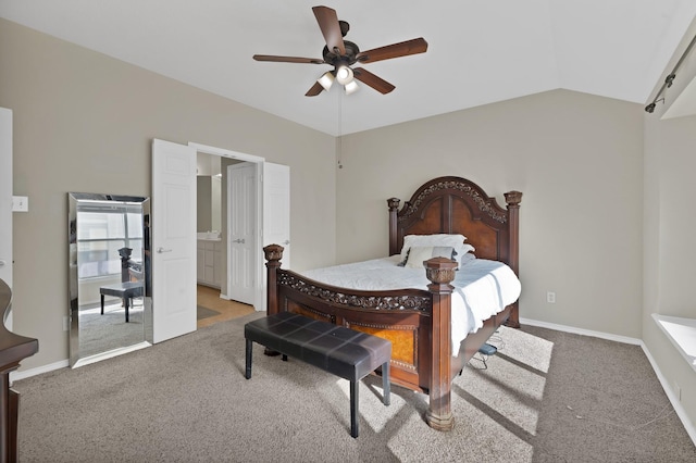 bedroom featuring baseboards, light colored carpet, ceiling fan, and vaulted ceiling