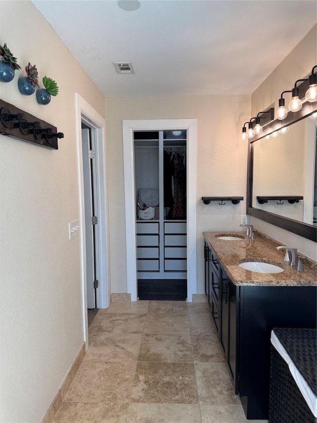 3200 Dover Dr, Plano, TX 75075 - full bath with double vanity and a walk in closet