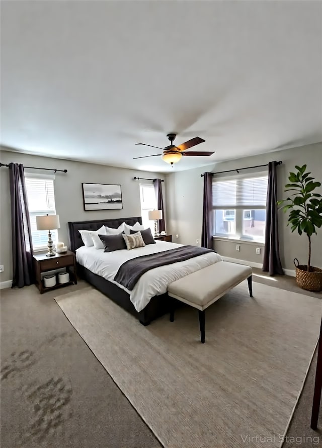 3200 Dover Dr, Plano, TX 75075 - carpeted bedroom with multiple windows and ceiling fan